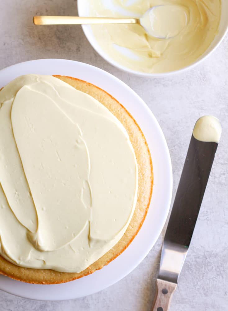 healthy lemon cream cheese frosting on a lemon cake