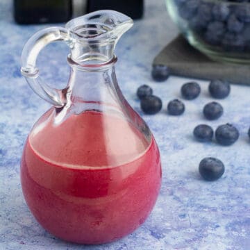 blueberry vinaigrette in a glass bottle
