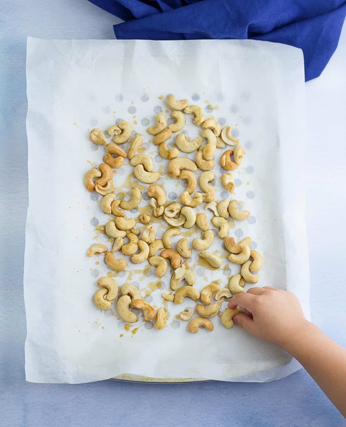 cashews on a baking sheet