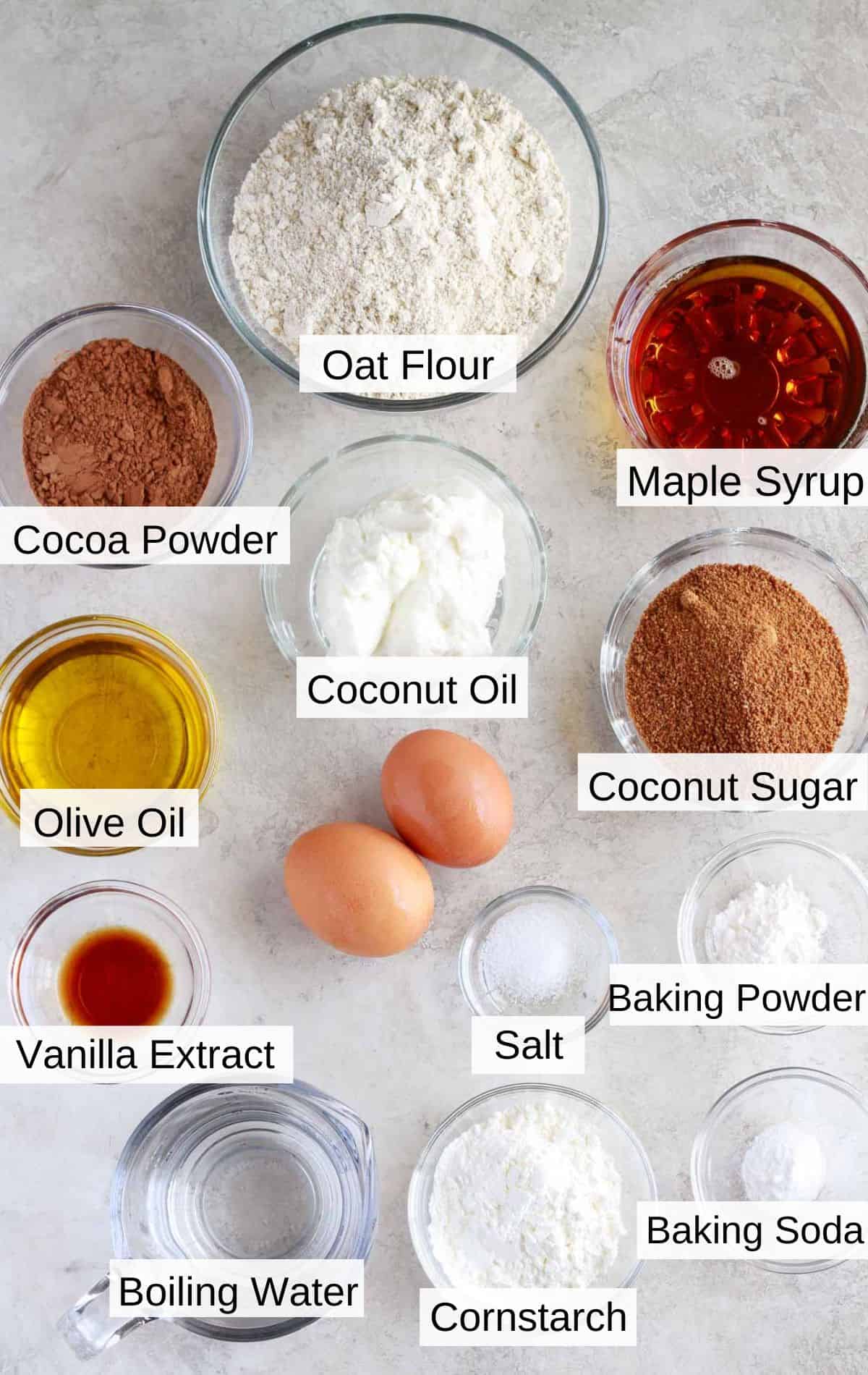 All of the ingredients to make a chocolate oat flour cake