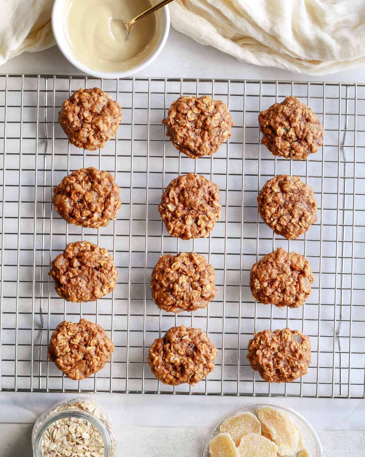 oatmeal ginger cookies on a cooling rack