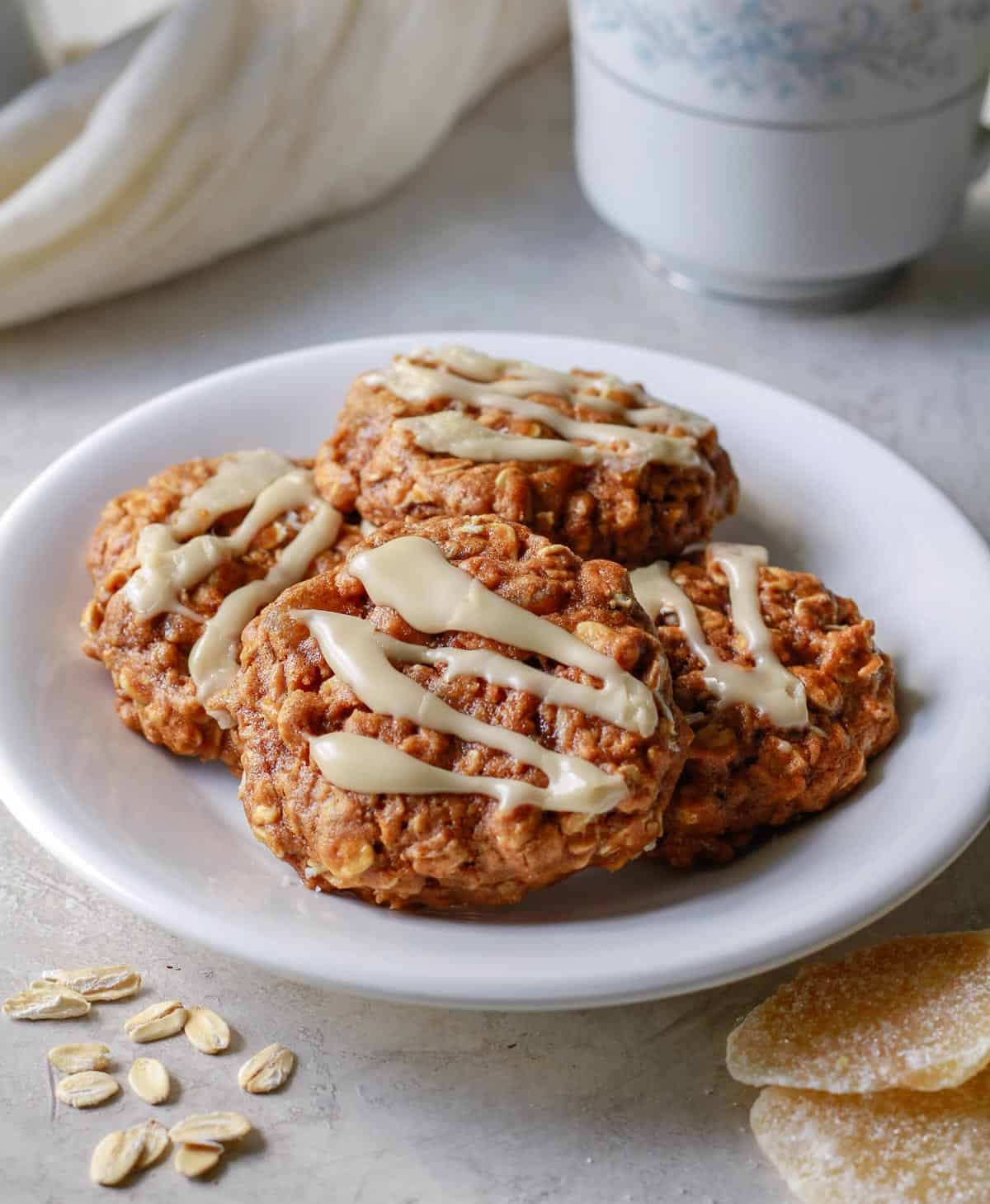 oatmeal cookies on a plate with candied ginger