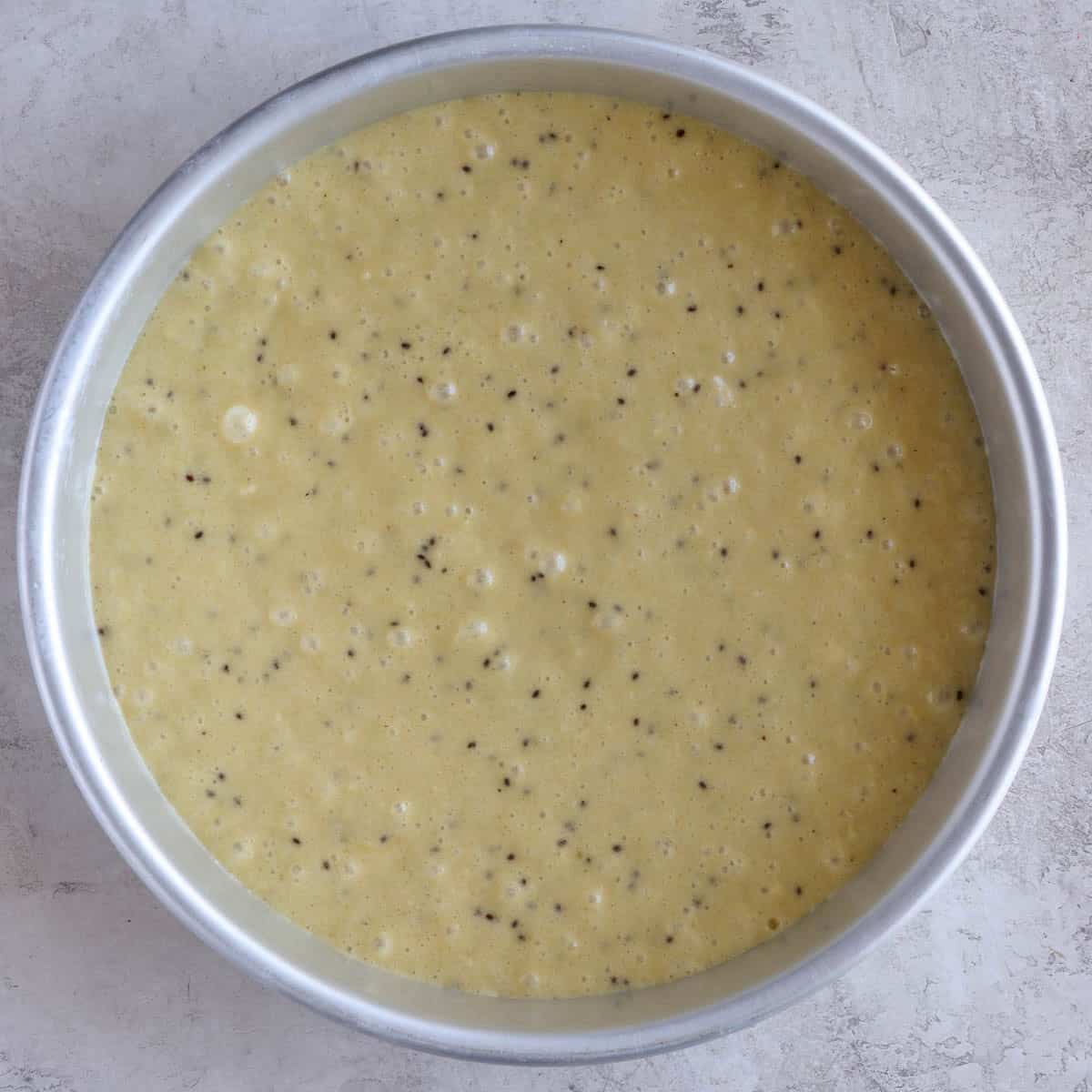 cake batter in a baking pan