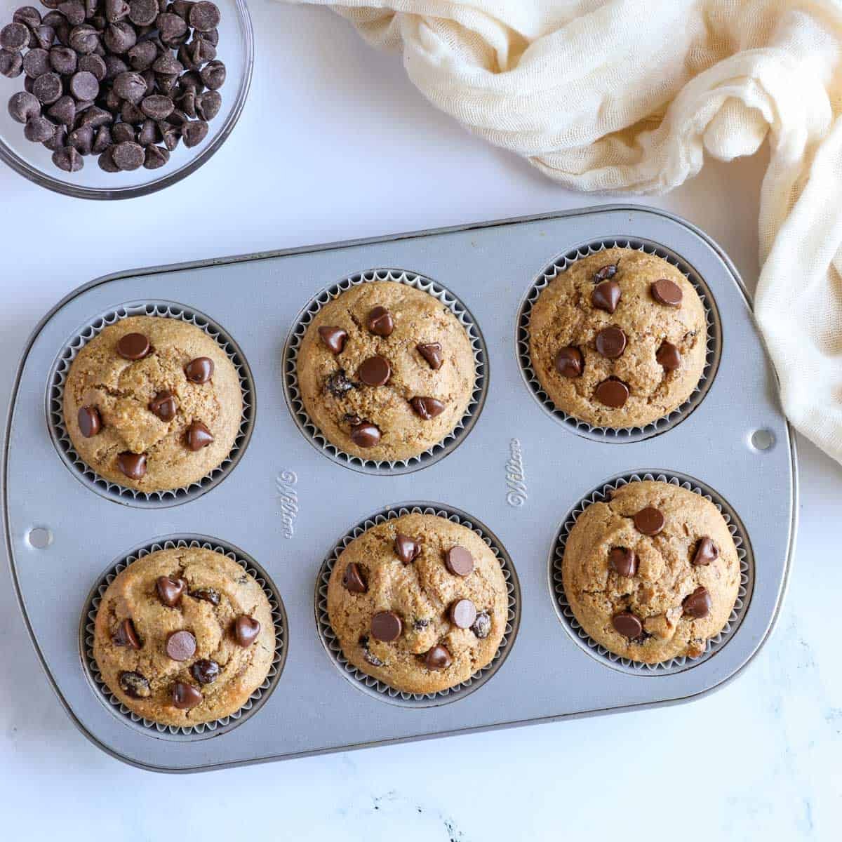 oat flour muffins freshly baked still in the muffin tin