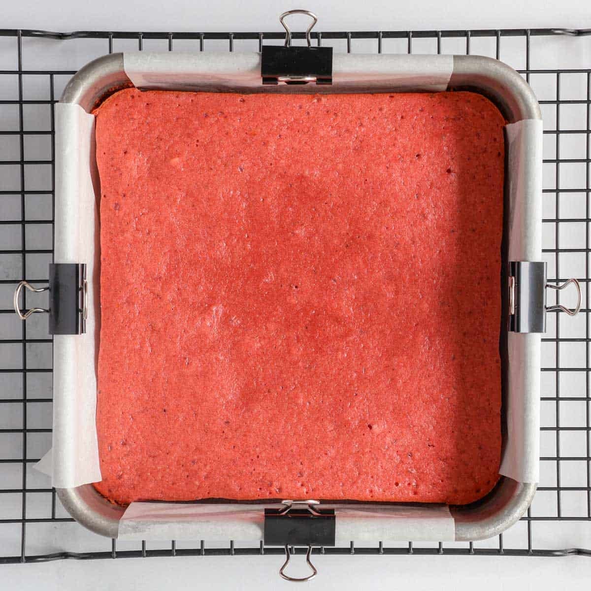 strawberry protein bars in an 8 inch pan right out of the oven