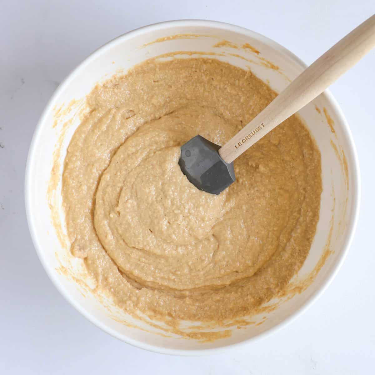 Dog muffin batter after combining the wet and dry ingredients.