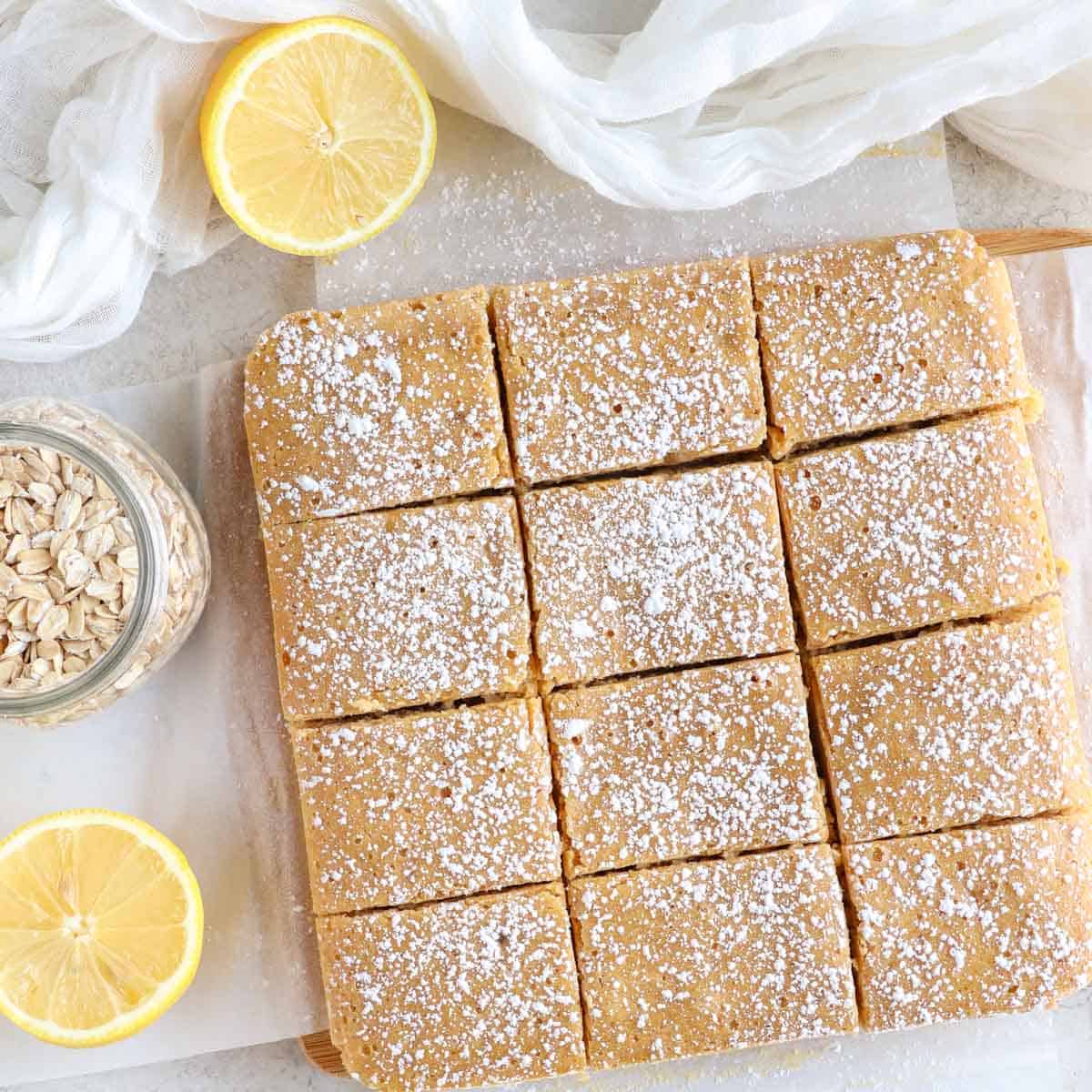 lemon protein bars dusted with powdered sugar